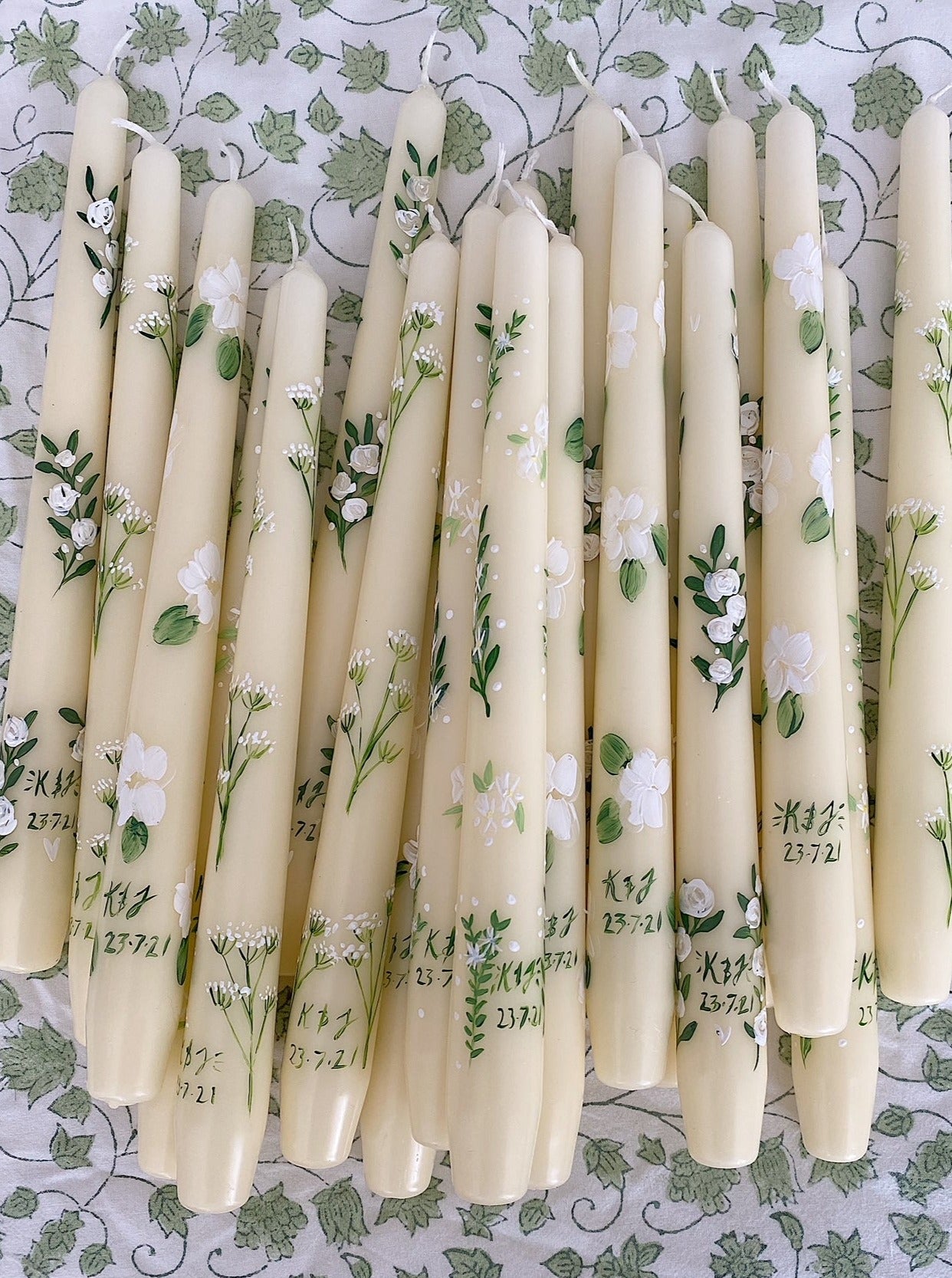 white and green wedding candles