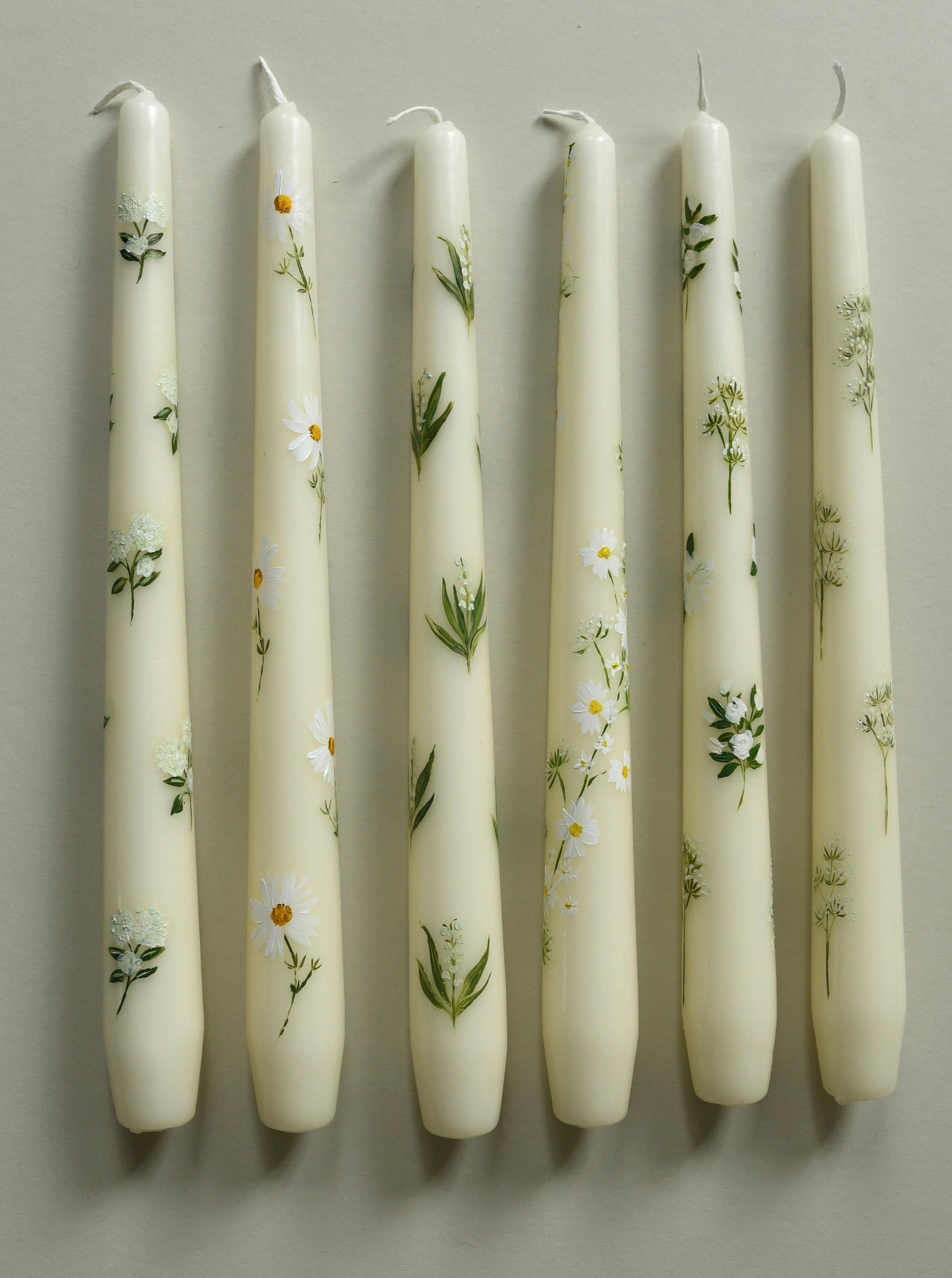 delicate hand painted ivory wedding candles 