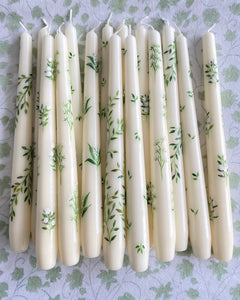 pile of ivory hand painted wedding candles