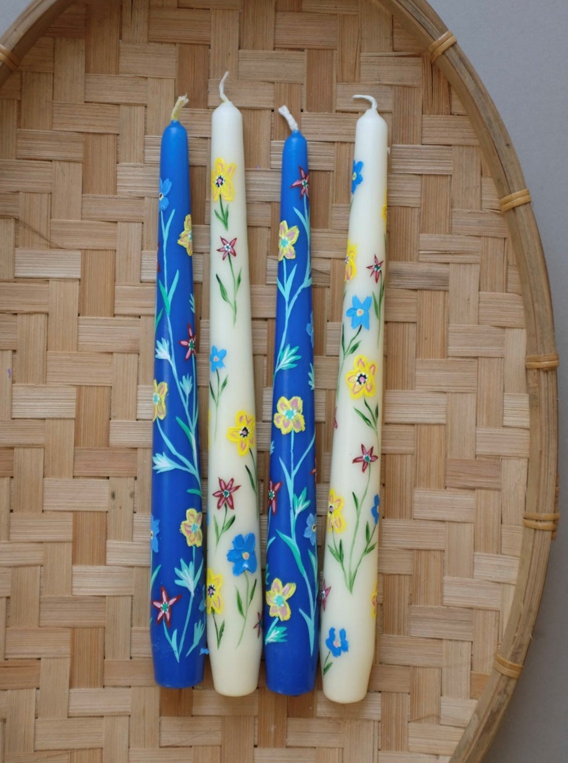 flat lay with hand painted floral candles